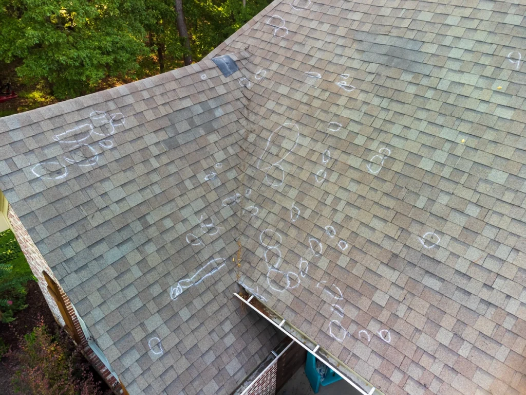 close up of roof hail damage photo for insurance claim