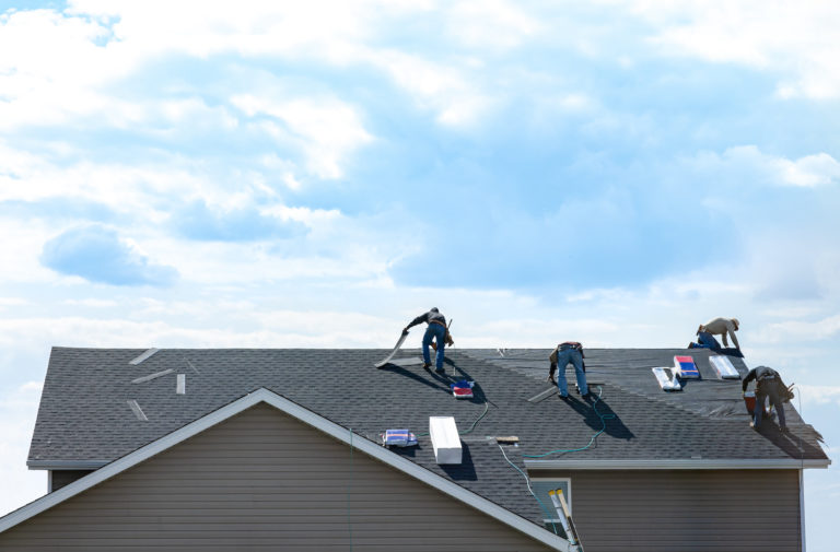 roof installation process workers