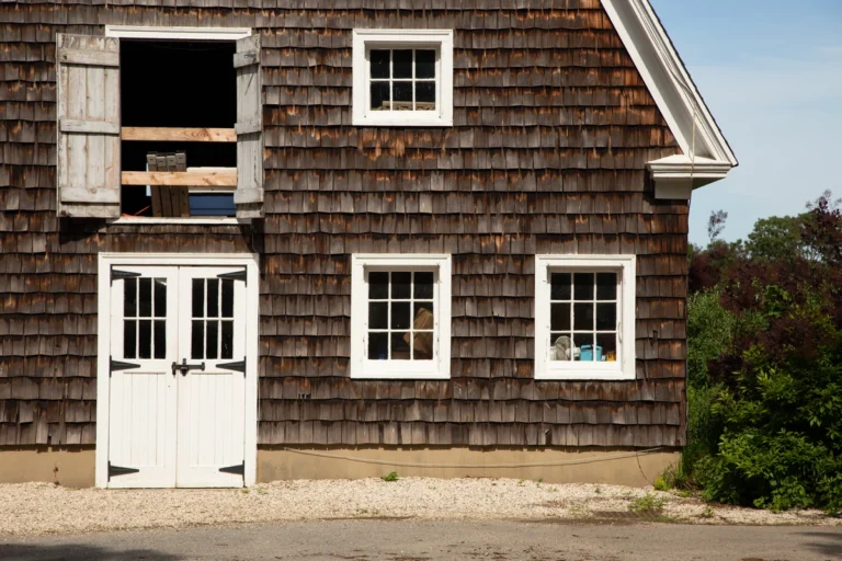 country side barn house with cedar siding